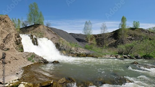 Waterfall and rocks on river Vydriha near village Belovo in Novosibirsk region,  Russia photo