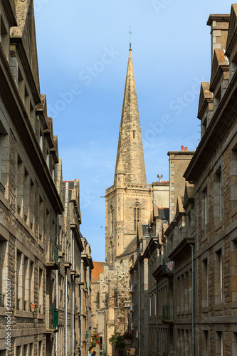 Beautiful urban cityscape view of the Saint-Malo cathedral bell tower in Brittany, France, a Roman Catholic church