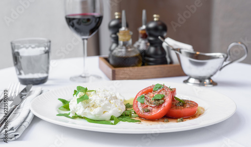 Italian cheese burrata, tomatoes, basil and olive oil