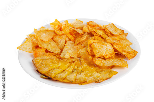 Snack, aperitif Assorted fried potatoes, chips, cheese, with spices, peppers, before alcohol, food on plate, white isolated background Side view. For the menu, restaurant bar cafe