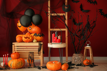 Creative decorations for Halloween party near color wall