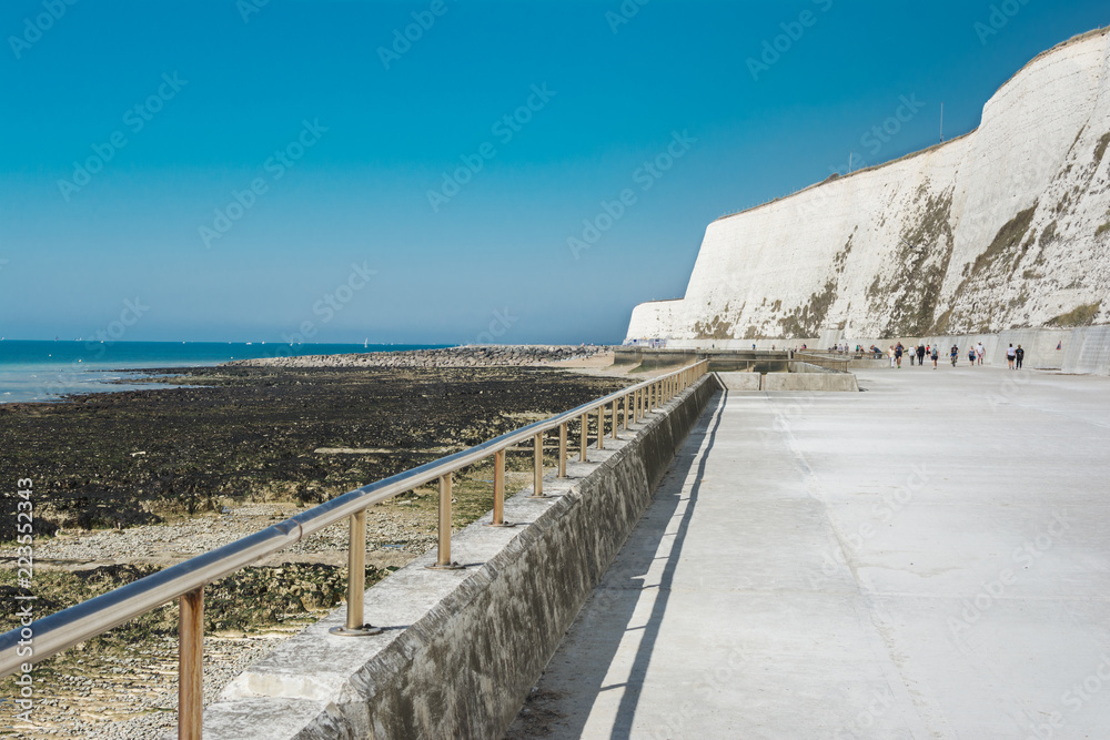 Undercliff coast walk in Saltdean, East Sussex, view of the sea in low tide, selective focus