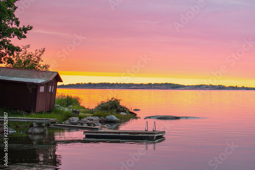 Looking past the swim float just after sunset on the Island of Aspö in Archipelago National Park (Skärgårdshavet nationalpark), Finland, 4 days after the summer solstice.