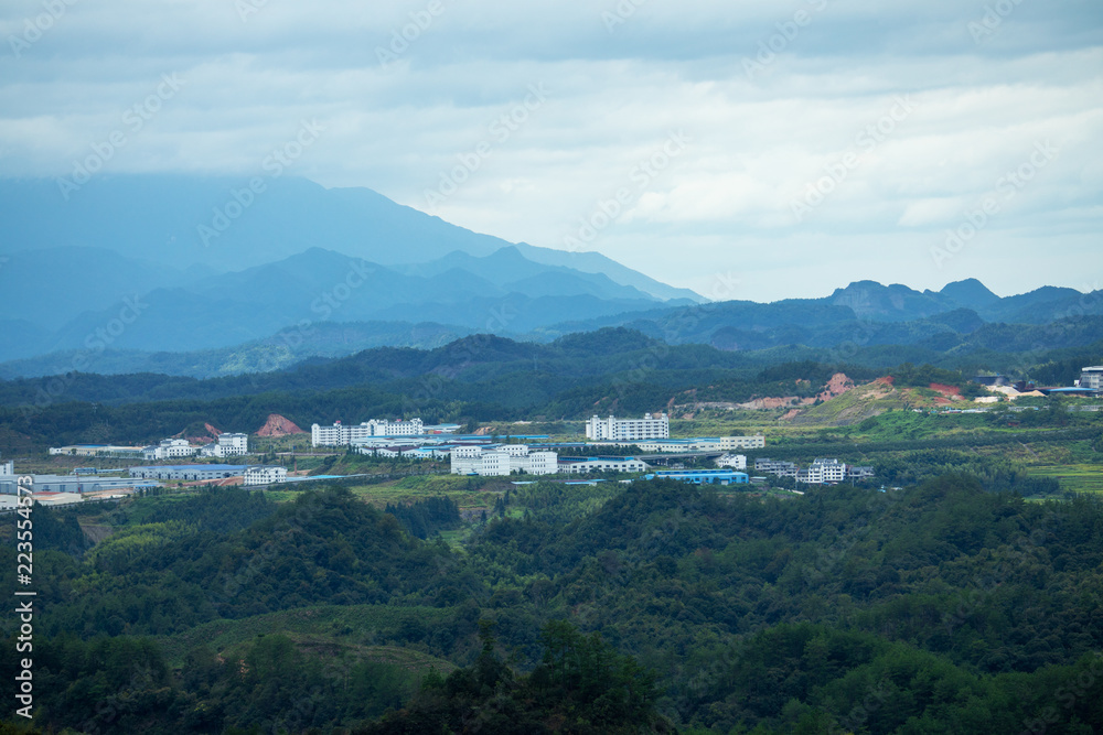 Mountain peak range landscape. Green mountain range view. Mountain peak blue sky white clouds panorama