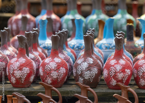 pottery, pots, pitchers in the village market photo