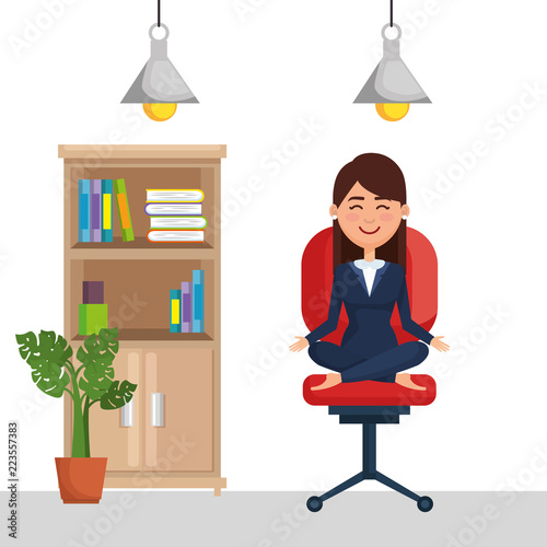 business woman practicing yoga in office chair