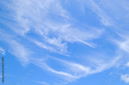 clouds in the blue sky background. © sorasak987