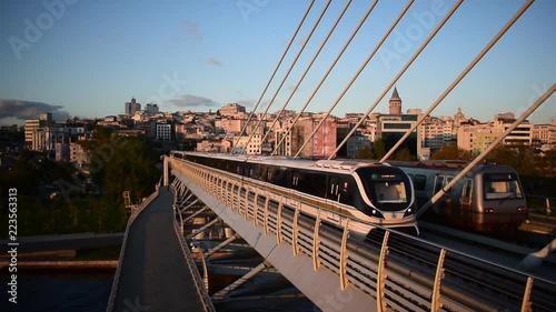 Two trains are crossing the underground bridge station  in istanbul