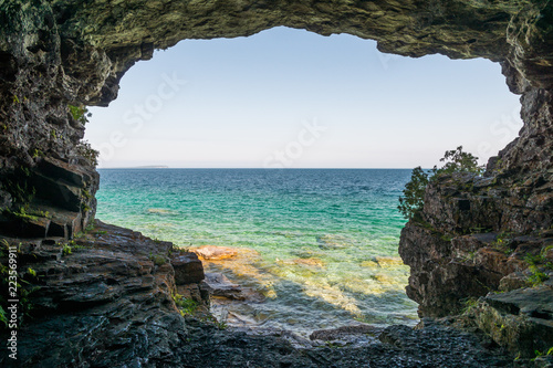 Landscape view from a cave at Bruce Peninsula shoreline at Cyprus Lake National Park coast line photo