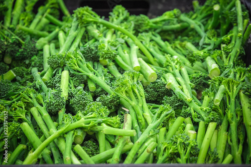 Fresh broccolini on display at Broadway Market, a street market in Hackney, East London