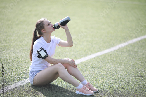 Fototapeta Naklejka Na Ścianę i Meble -  Girl and sport lifestyle doing exercises
