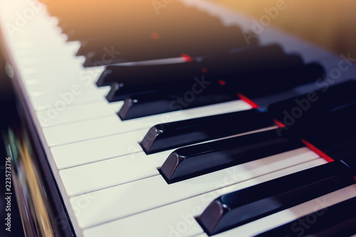 Close up to the piano keyboard background with selective focus