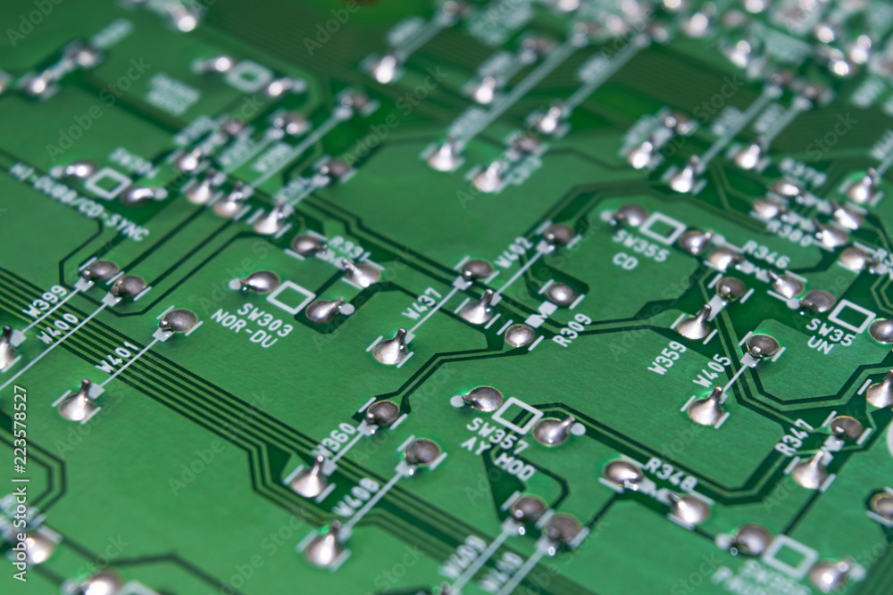 part of an electronic circuit board with a microcircuit and electronic components. part of an electronic circuit board with a microcircuit and electronic components.