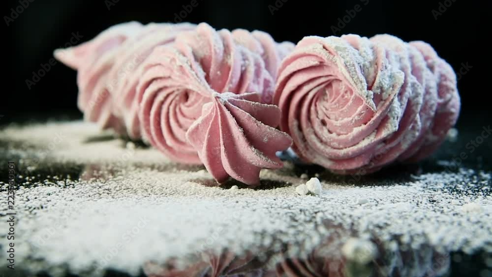 panorama up on pink marshmallows sprinkled with sugar powder panorama up on pink marshmallows sprinkled with sugar powder