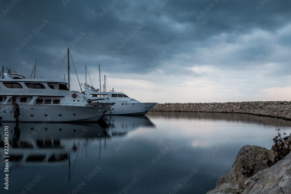 Fototapeta premium Yachts staying at the bay in the morning