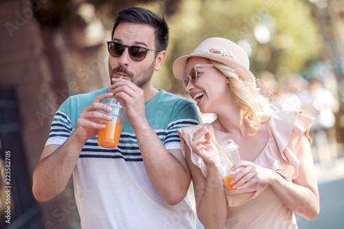 Young couple drinking juice