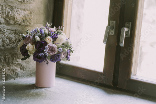 Wedding Flower Bouquet with purple coloured flowers. photo