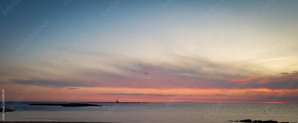 Obraz premium Sunset over the sea in southern Italy a Gallipoli, Italy.