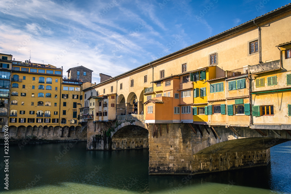 Medieval bridge Ponte Vecchio (Old Bridge) and the Arno River in Florence, Tuscany, Italy.