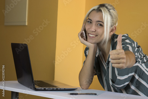 Office worker with telephone photo