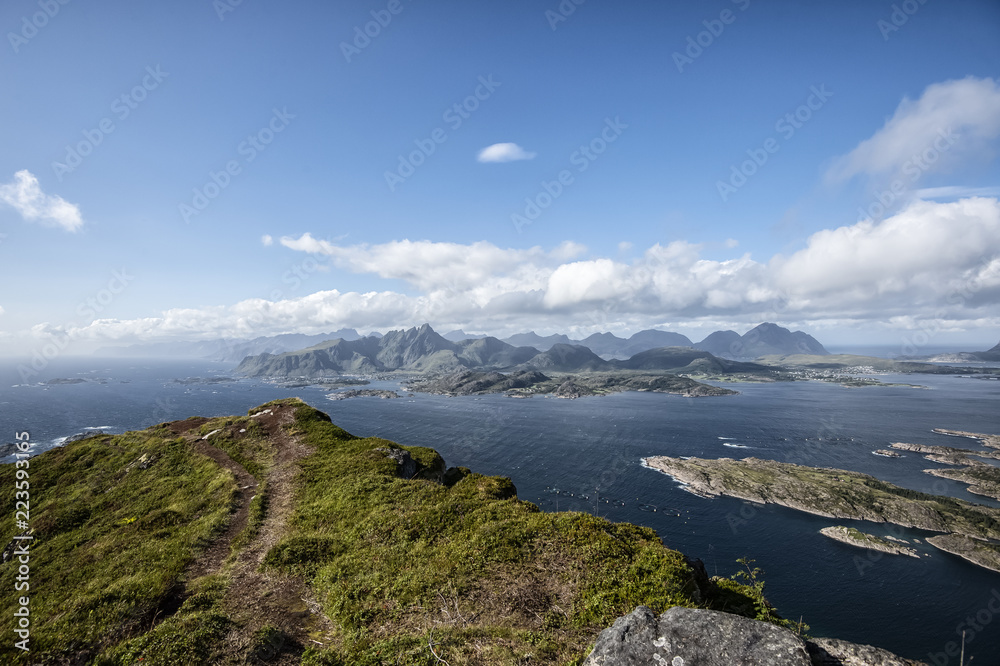 The photo shows part of the western Lofoten islands. Shot from a mountain in Vestvagoy called Mt. Middagstinden.