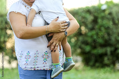 Woman holding a young boy