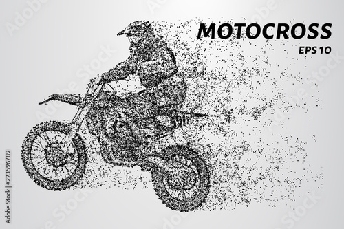 Rider on a motorcycle involved in motocross.Jumps and takes off on a springboard.