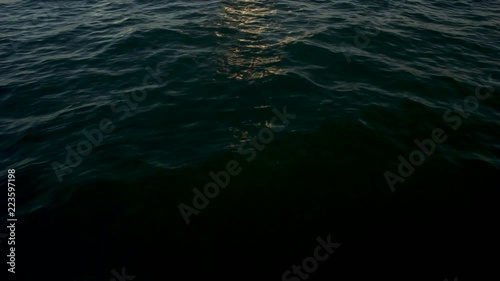 Sea with waves and clear sky calm ocean water surface with small ripples. vivid blue sea wave water abstract background. Blue water surface. Blue sea with waves
