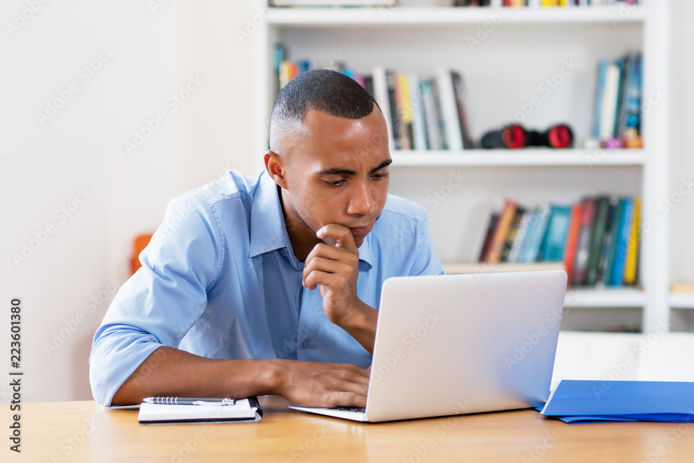 African american businessman with computer problems African american businessman with computer problems