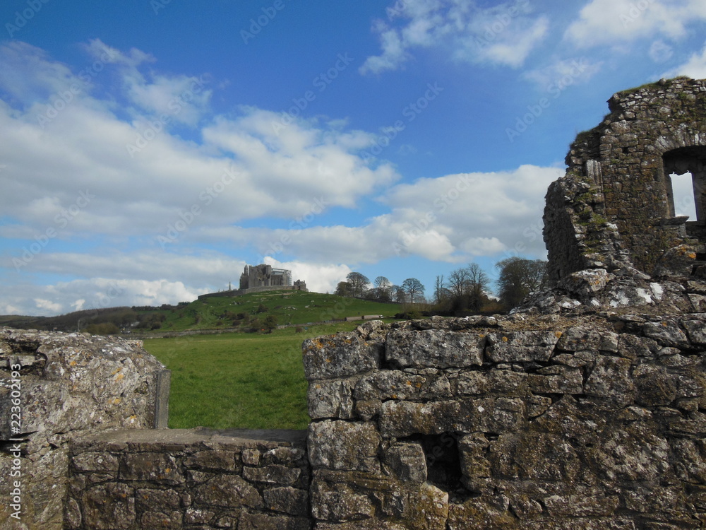 View of Rock of Cashel from monastery ruins in Ireland