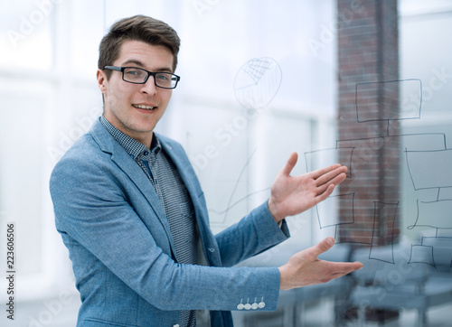 young businessman inviting to his office