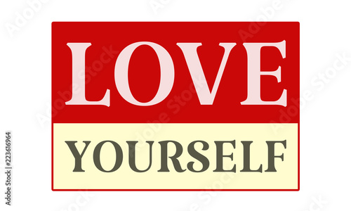 Love Yourself - written on red card on white background