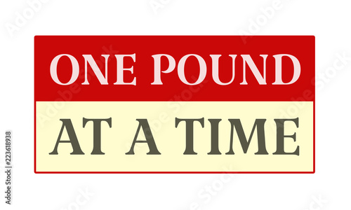 One Pound At A Time - written on red card on white background