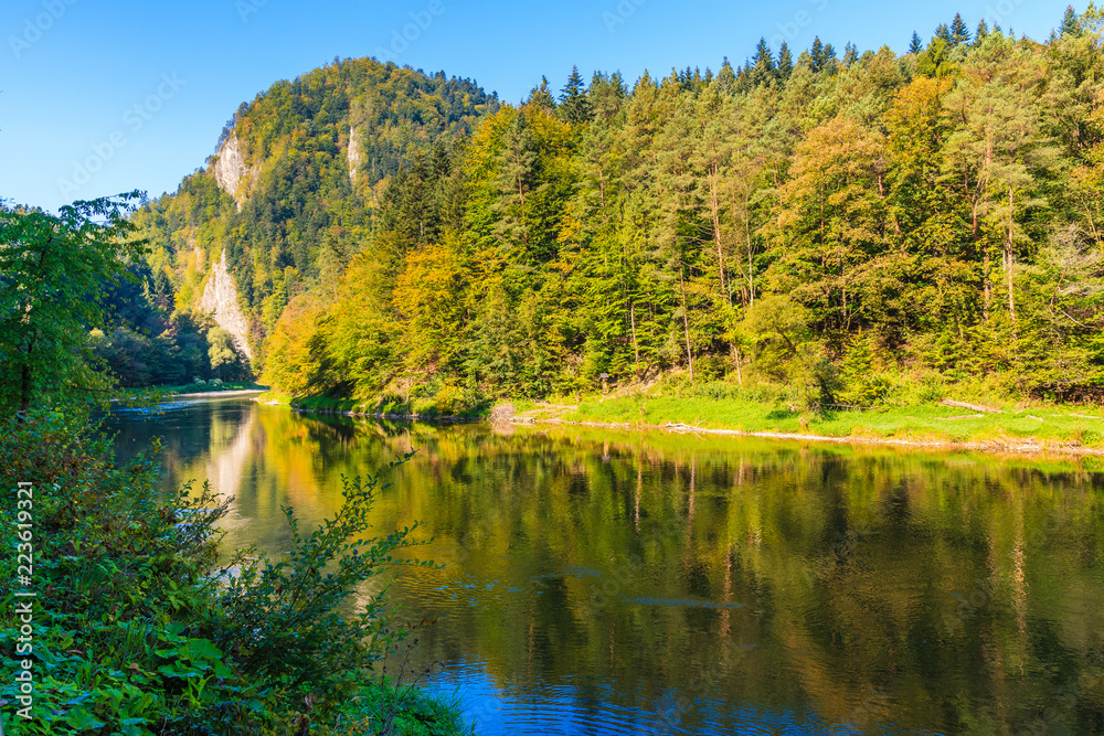 View of Dunajec river in autumn landscape of Pieniny Mountains, Poland View of Dunajec river in autumn landscape of Pieniny Mountains, Poland