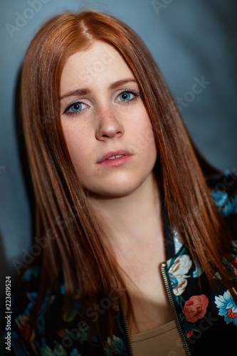 Closeup portrait of attractive ginger girl