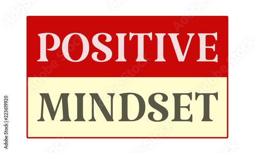 Positive Mindset - written on red card on white background