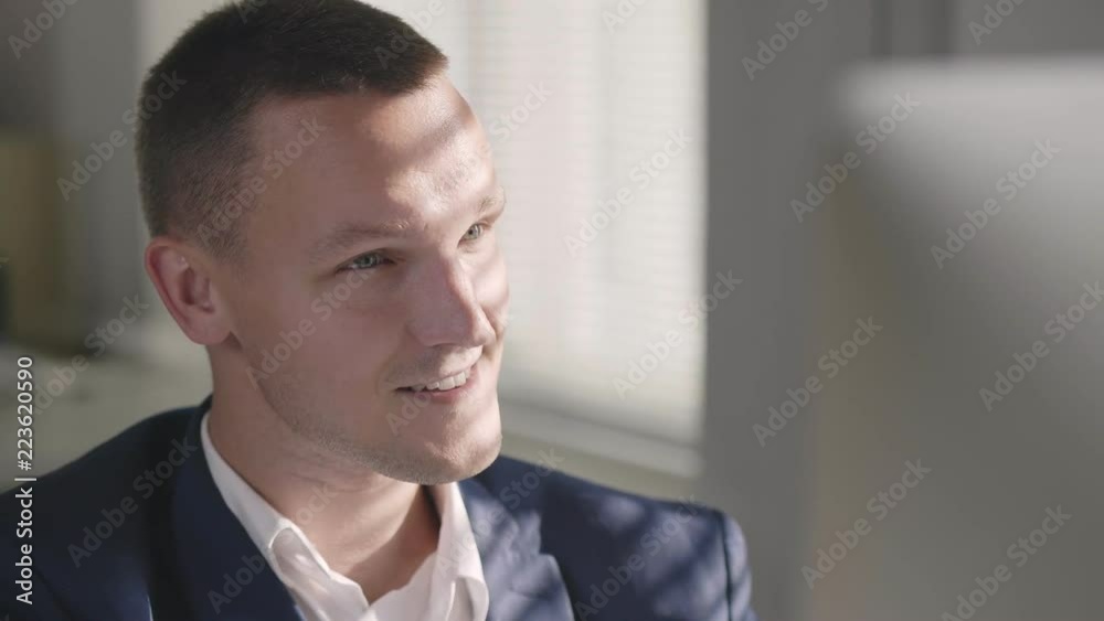 Portrait of young handsome male caucasian office employee Portrait of young handsome male caucasian office employee