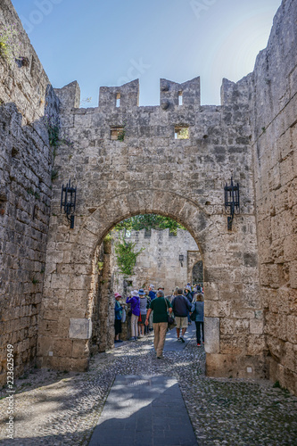 Rhodes, Greece: Tourists in a narrow courtyard visit the 14th-century Palace of the Grand Master of the Knights of Rhodes. © Linda Harms