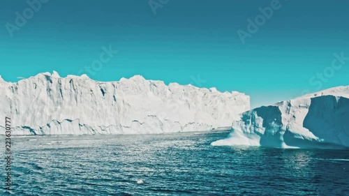 Ice floe floating in the ocean photo