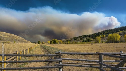 Massive wildfire smoke covering a huge land area. Wyoming forest fire in Bridger-Teton National Forest. 4K time lapse.