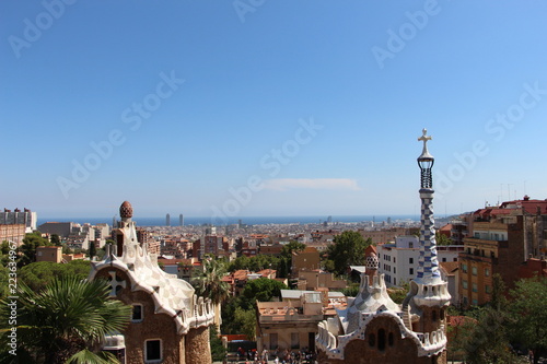 Top of the two pavilions in Park Guell with Barcelona