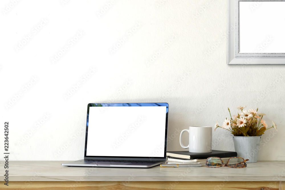 Workspace mockup blank screen laptop and supplies. Workspace mockup blank screen laptop and supplies.