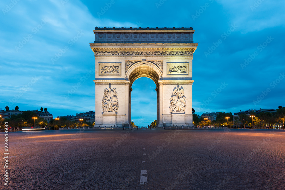 Arc de Triomphe and Champs Elysees, Landmarks in center of Paris, at night. Paris, France