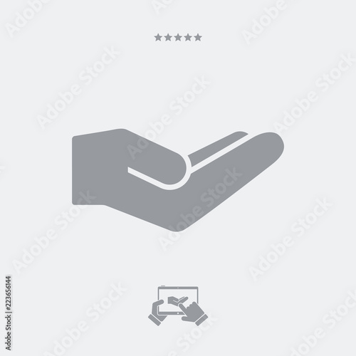 Hand in gesture of charity