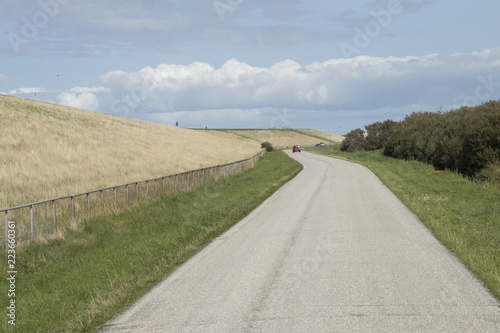 Rural road along the Wadden-sea dike