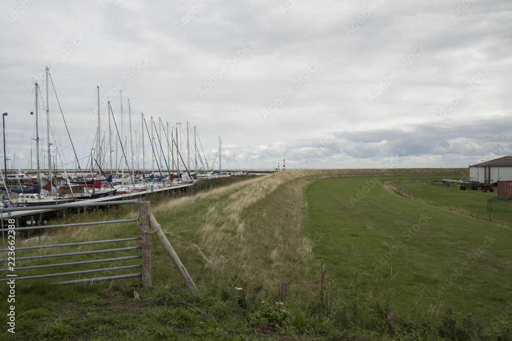 Marina stores yachts outside the dike Marina stores yachts outside the dike