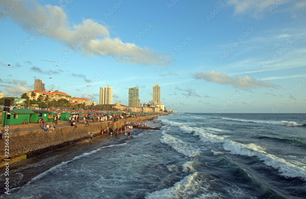 Sunset at the Galle Face beachfront urban park area and seawall in Colombo Sri Lanka Asia Sunset at the Galle Face beachfront urban park area and seawall in Colombo Sri Lanka Asia