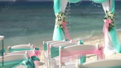 Scenery for a wedding on the beach with a cruise liner in the background