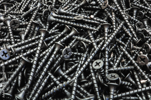 Black self-tapping screw. Screws for construction work.