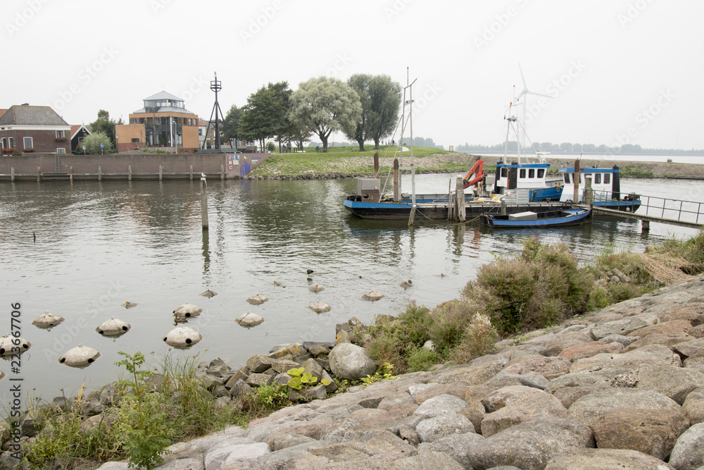 Fototapeta premium Fishing boat mooring in the harbor